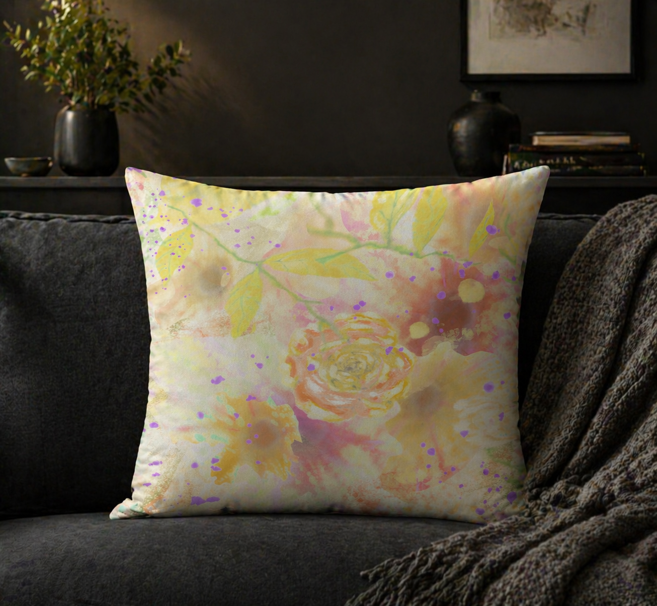 Decorative pillow with floral pattern on a dark sofa