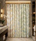 Bathroom with a patterned shower curtain