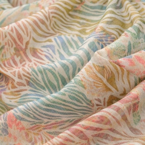 Close-up of patterned fabric with pastel colors