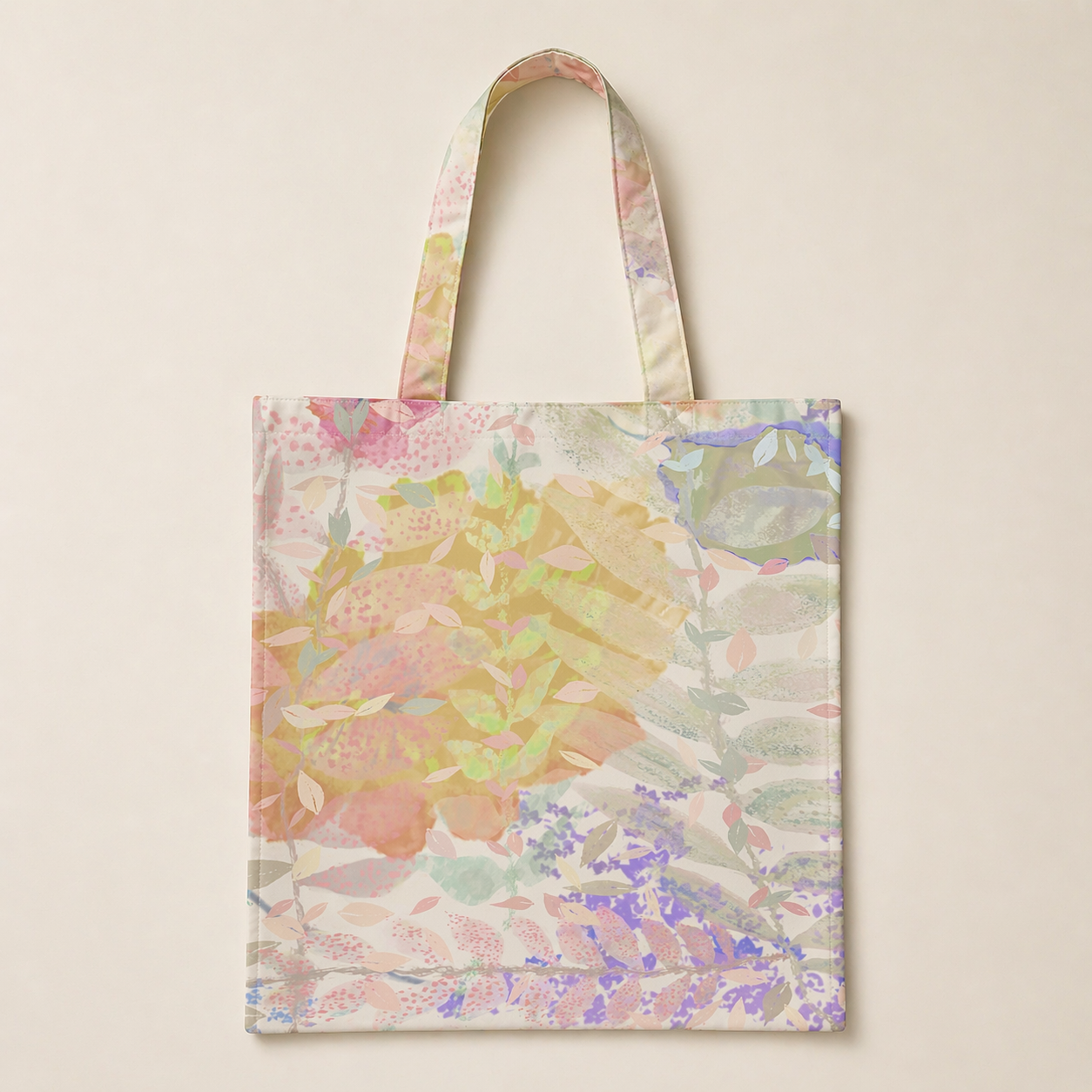 Tote bag with a pastel floral pattern on a beige background