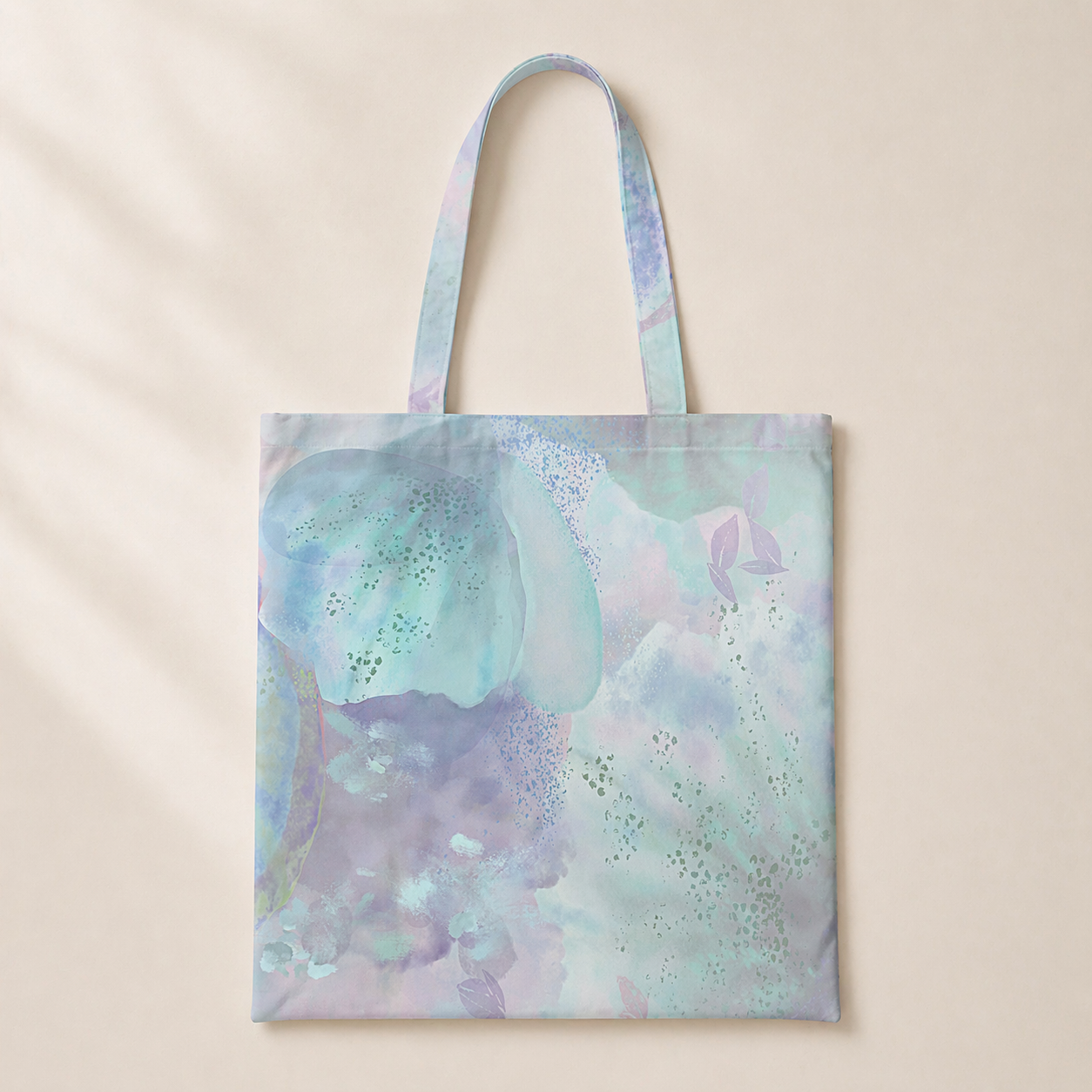 Tote bag with a pastel floral design on a beige background