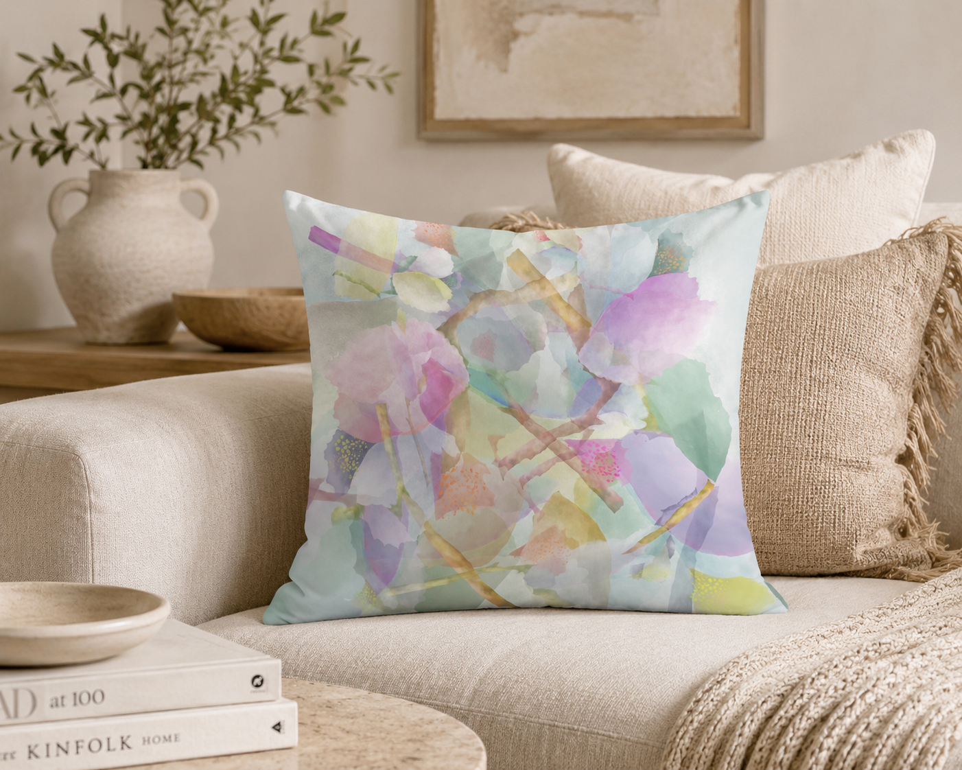 Decorative pillow with abstract pattern on a couch in a living room setting