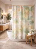 Bathroom with a floral shower curtain, freestanding bathtub, and wooden stool.